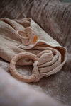 Muslin comforter with brown leaf ring